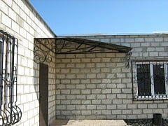 Изготовление кованой решетки на окна и навеса