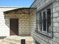 Изготовление кованой решетки на окна и навеса